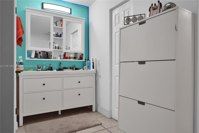 1131 SW 104th Ct, Miami, FL 33174 - bathroom with tile patterned flooring and vanity