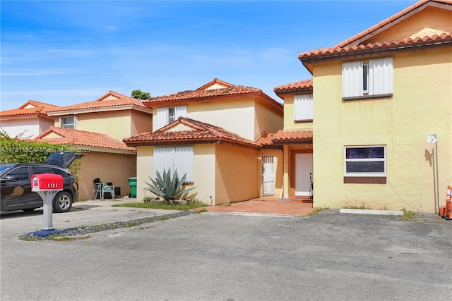 1131 SW 104th Ct, Miami, FL 33174 - view of front of property featuring a tile roof and stucco siding