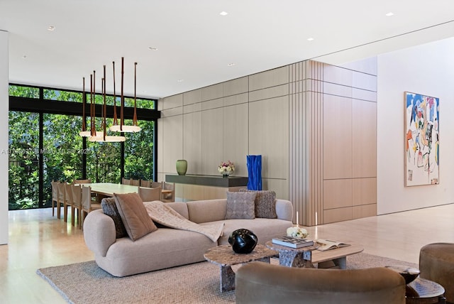 194 S Island Dr, Golden Beach, FL 33160 - living room featuring floor to ceiling windows
