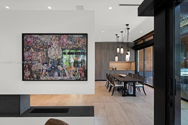 dining space with recessed lighting