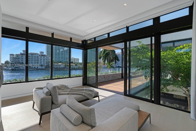 194 S Island Dr, Golden Beach, FL 33160 - sunroom / solarium with a water view