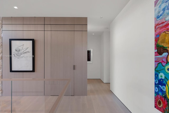 hallway featuring wood finished floors