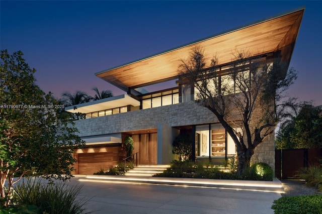 194 S Island Dr, Golden Beach, FL 33160 - modern home with stone siding