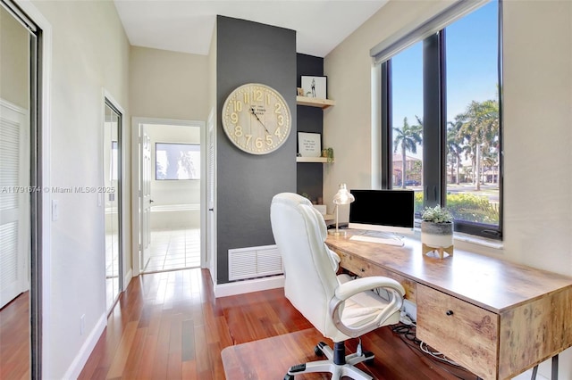 3260 SW 189th Ave, Miramar, FL 33029 - office featuring baseboards, visible vents, plenty of natural light, and wood finished floors