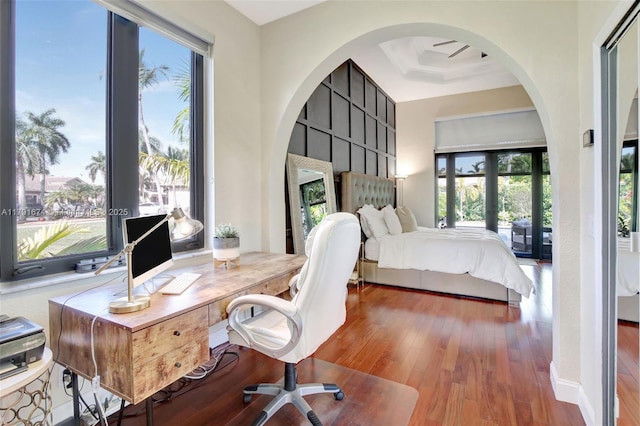 3260 SW 189th Ave, Miramar, FL 33029 - bedroom featuring arched walkways and wood finished floors