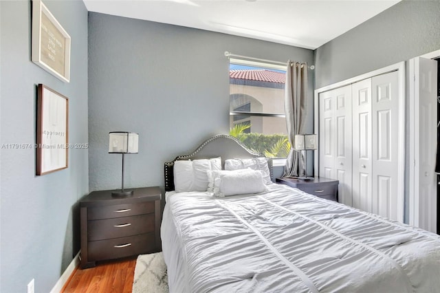 3260 SW 189th Ave, Miramar, FL 33029 - bedroom with baseboards, a closet, and wood finished floors