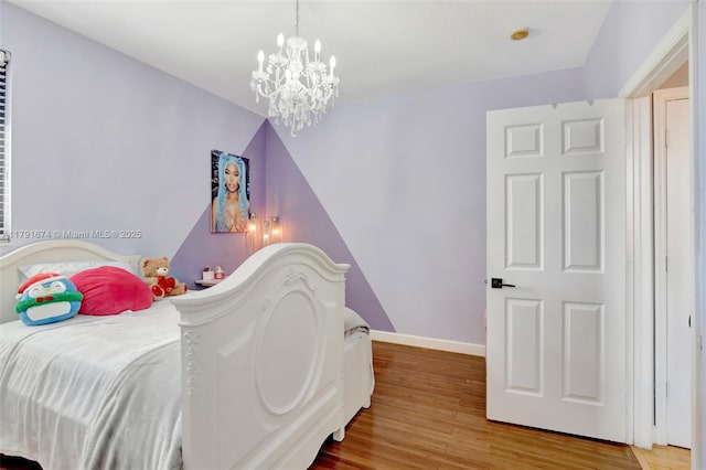3260 SW 189th Ave, Miramar, FL 33029 - bedroom featuring an inviting chandelier, baseboards, and wood finished floors