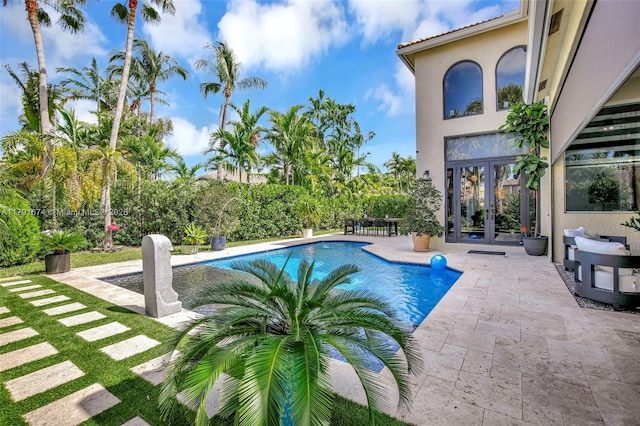 3260 SW 189th Ave, Miramar, FL 33029 - outdoor pool featuring a patio and french doors