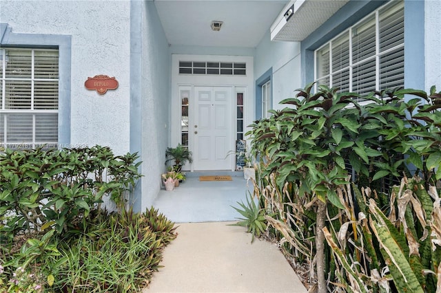 1754 Turtle Rock Dr, Lakeland, FL 33803 - property entrance with stucco siding