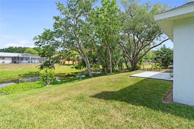 1754 Turtle Rock Dr, Lakeland, FL 33803 - view of yard featuring a patio