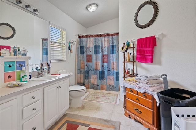1754 Turtle Rock Dr, Lakeland, FL 33803 - full bath with tile patterned floors, a shower with shower curtain, toilet, vanity, and lofted ceiling