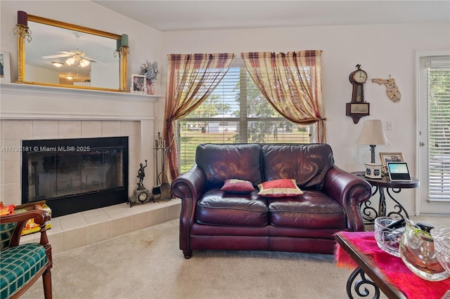 1754 Turtle Rock Dr, Lakeland, FL 33803 - living area featuring a ceiling fan, carpet, and a fireplace