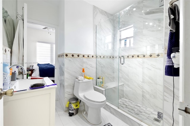 1922 NW 4th St, Miami, FL 33125 - ensuite bathroom with a stall shower, tile walls, toilet, ensuite bath, and vanity
