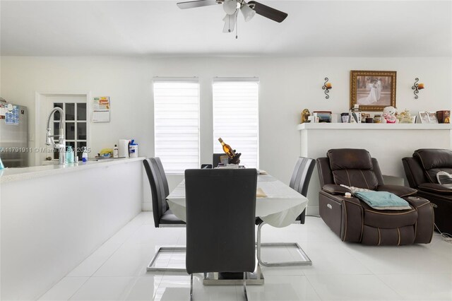1922 NW 4th St, Miami, FL 33125 - dining area featuring a ceiling fan and light tile patterned floors