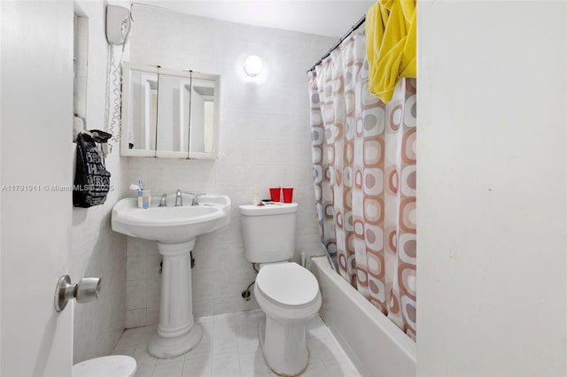 1922 NW 4th St, Miami, FL 33125 - full bath with toilet, tile walls, shower / tub combo, and a sink
