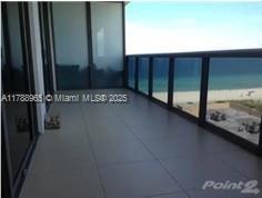 5875 Collins Ave Unit 1006, Miami Beach, FL 33140 - balcony featuring a beach view and a water view
