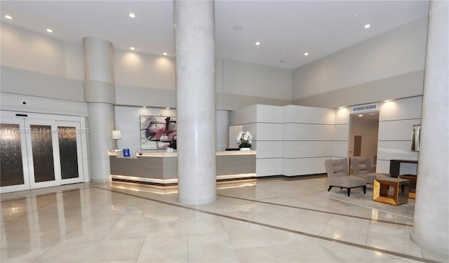 welcome area with visible vents and decorative columns