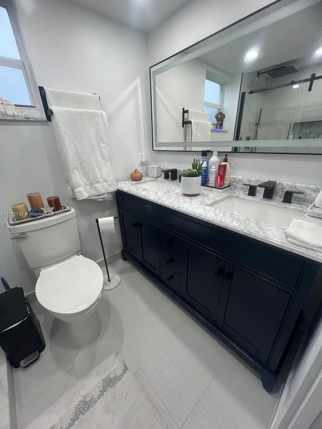 9880 Marina Blvd Unit 1516, Boca Raton, FL 33428 - full bath featuring a healthy amount of sunlight, vanity, a shower with shower door, and toilet
