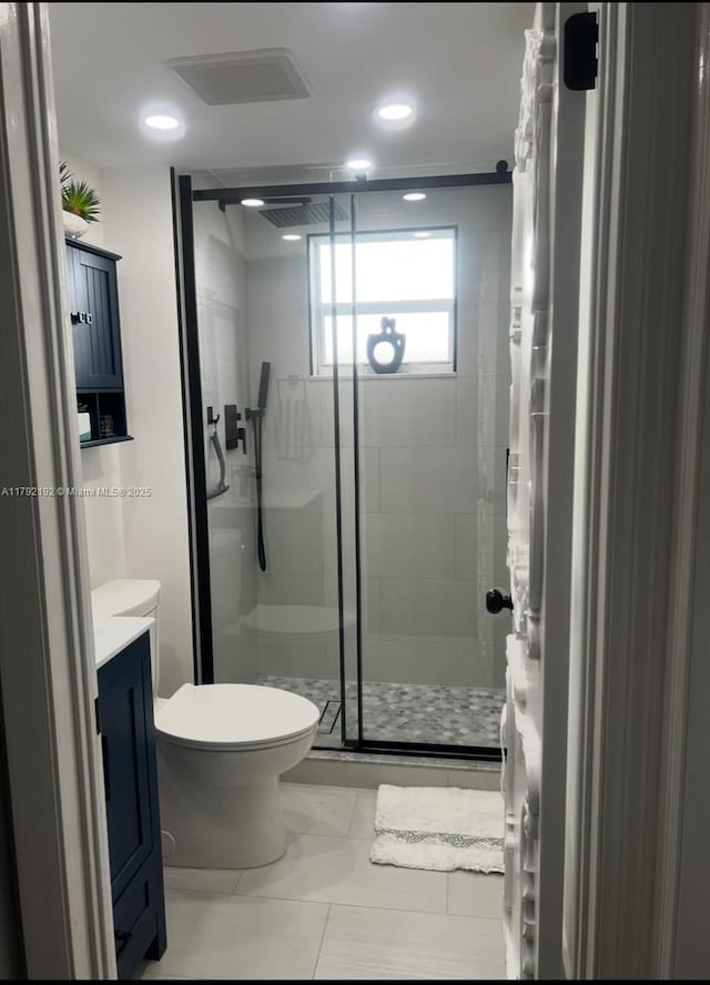 9880 Marina Blvd Unit 1516, Boca Raton, FL 33428 - bathroom with visible vents, vanity, toilet, recessed lighting, and a stall shower