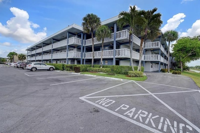 9880 Marina Blvd Unit 1516, Boca Raton, FL 33428 - view of building exterior featuring uncovered parking