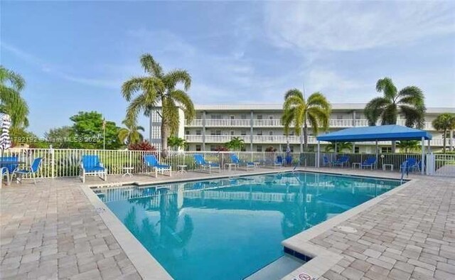 9880 Marina Blvd Unit 1516, Boca Raton, FL 33428 - pool featuring fence and a patio area