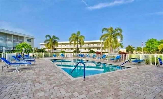 9880 Marina Blvd Unit 1516, Boca Raton, FL 33428 - pool with a patio area and fence