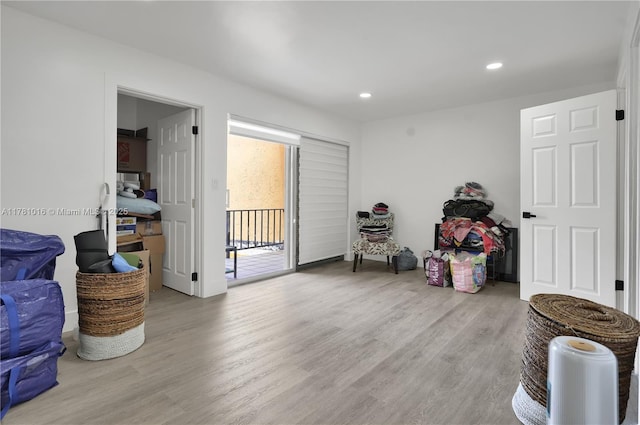 sitting room featuring recessed lighting and light wood finished floors