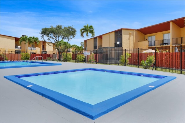 community pool with fence