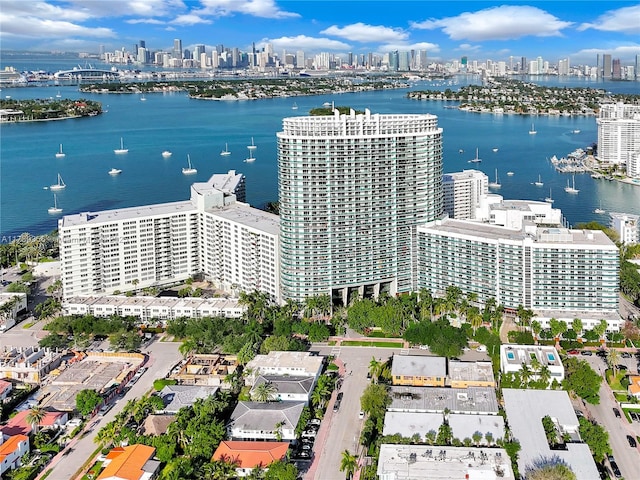 bird's eye view featuring a city view and a water view