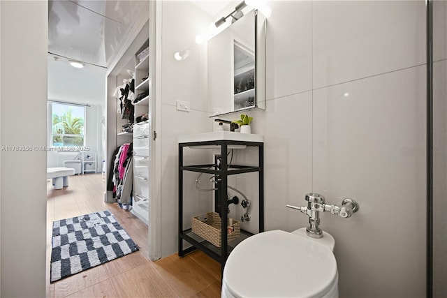 bathroom featuring wood finished floors