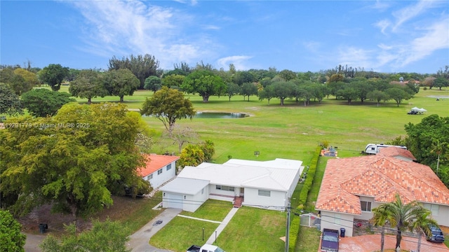 1025 Hunting Lodge Dr, Miami Springs, FL 33166 - aerial view of a nearby body of water and a tree filled landscape