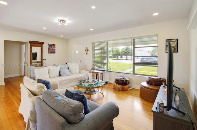 1025 Hunting Lodge Dr, Miami Springs, FL 33166 - living area featuring light wood-type flooring, recessed lighting, and baseboards