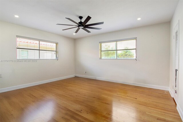 1025 Hunting Lodge Dr, Miami Springs, FL 33166 - unfurnished bedroom featuring light wood-style flooring, recessed lighting, baseboards, and ceiling fan