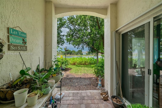 exterior space with a water view