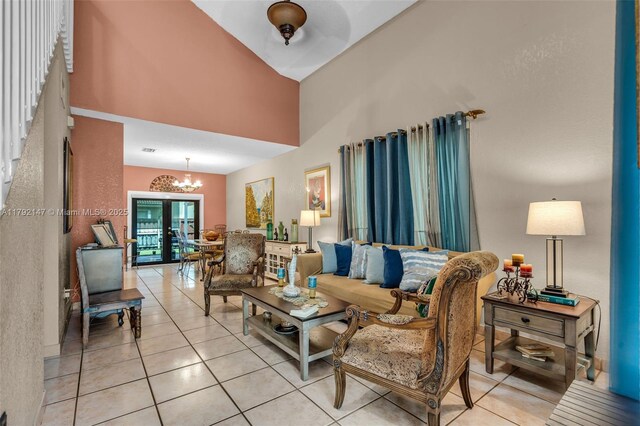19404 NW 79th Ct, Hialeah, FL 33015 - living room featuring a towering ceiling, tile patterned flooring, and a chandelier