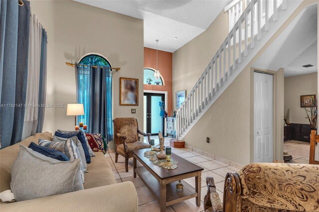 19404 NW 79th Ct, Hialeah, FL 33015 - living room featuring stairway and light tile patterned floors
