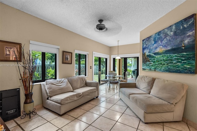19404 NW 79th Ct, Hialeah, FL 33015 - living room with light tile patterned floors and a textured ceiling