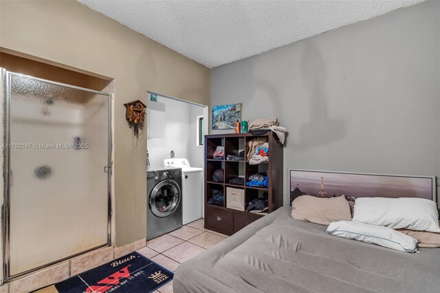 19404 NW 79th Ct, Hialeah, FL 33015 - bedroom with washing machine and dryer, tile patterned flooring, and a textured ceiling
