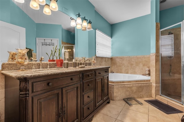 19404 NW 79th Ct, Hialeah, FL 33015 - bathroom with tile patterned floors, a shower stall, a bath, and double vanity