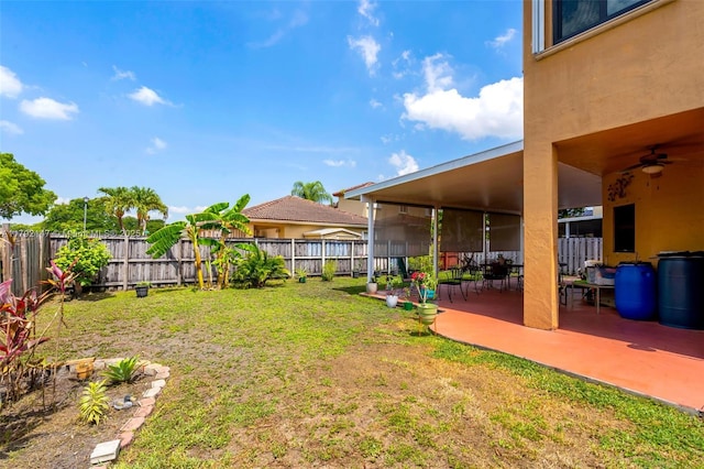 19404 NW 79th Ct, Hialeah, FL 33015 - view of yard with ceiling fan and a patio area