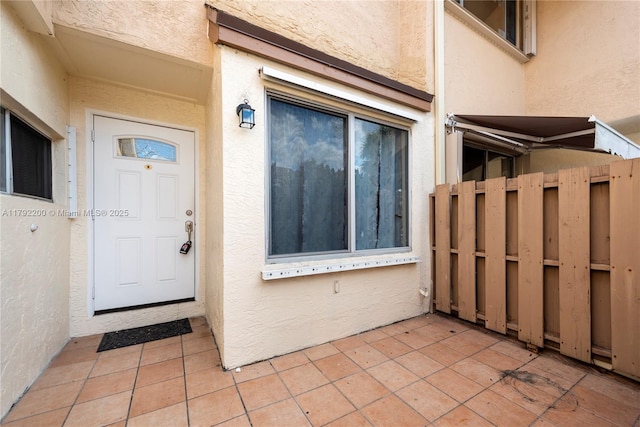 862 NW 81st Ter Unit 6, Plantation, FL 33324 - property entrance featuring fence and stucco siding