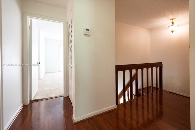 862 NW 81st Ter Unit 6, Plantation, FL 33324 - hall with an upstairs landing, wood finished floors, and baseboards