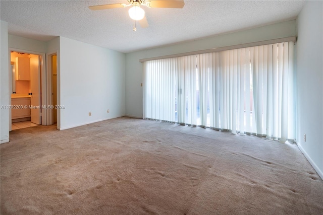 862 NW 81st Ter Unit 6, Plantation, FL 33324 - unfurnished room featuring a textured ceiling, ceiling fan, carpet flooring, and baseboards