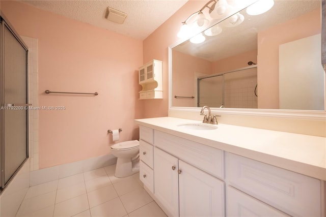 862 NW 81st Ter Unit 6, Plantation, FL 33324 - bathroom with vanity, tile patterned floors, toilet, an enclosed shower, and visible vents