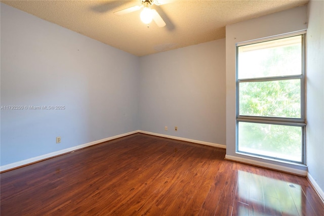 862 NW 81st Ter Unit 6, Plantation, FL 33324 - spare room featuring baseboards, wood finished floors, ceiling fan, and a textured ceiling
