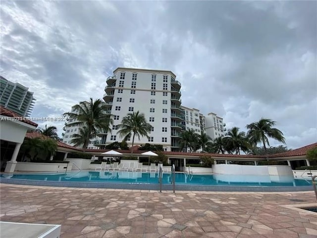 pool with a patio area