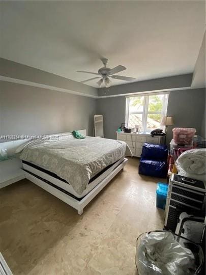 bedroom featuring ceiling fan