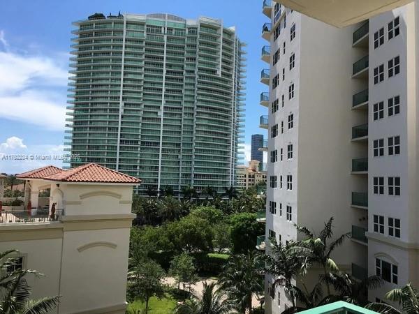 view of building exterior featuring a view of city