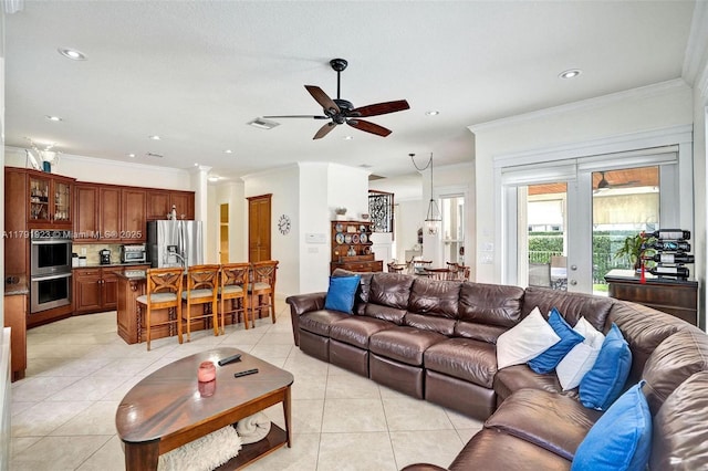 19323 SW 55th St, Miramar, FL 33029 - living room with a ceiling fan, crown molding, light tile patterned floors, a toaster, and recessed lighting