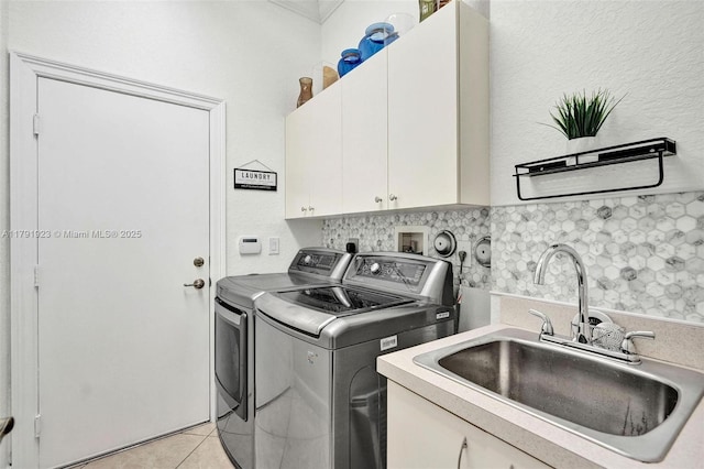 19323 SW 55th St, Miramar, FL 33029 - laundry room featuring a sink, cabinet space, independent washer and dryer, and light tile patterned floors